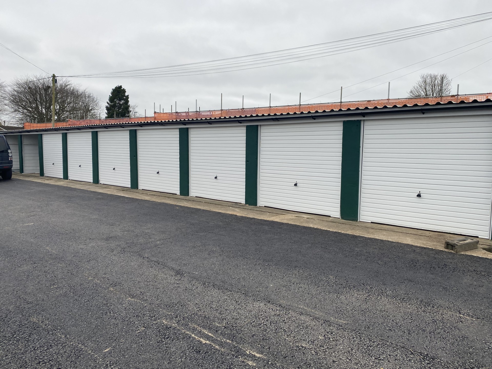 Row of 48 refurbished single and double lock-up garages to rent at The Storage Containers Sherborne, Wingfield Road, DT9 3HH
